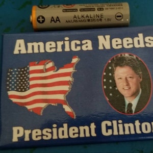 Vintage America Needs President Clinton Pin Button