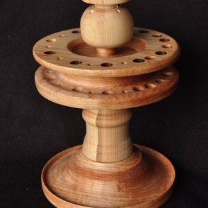 You can now  order a model 709A tool stand  from different wood types and hole sizes and peg options