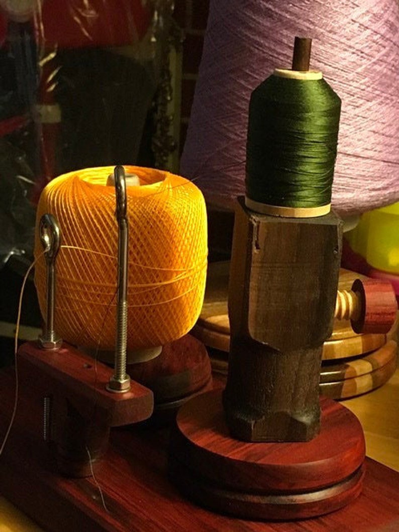 Thread/yarn dispenser stand made to fit your spool needs .also Etsy