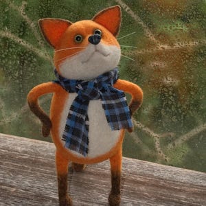 Zorro valiente, Zorro marimacho, Zorro con bufanda, blanco, naranja, marrón.