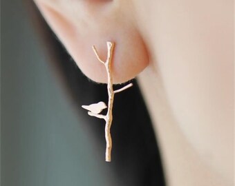 Boucles d'oreilles oiseaux sur la branche