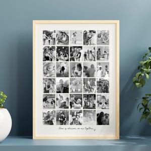 May include: A framed collage of black and white photographs. The photos are arranged in a grid pattern, showcasing various family moments. The frame is light-colored, and the text "Home is wherever we are together" is at the bottom.