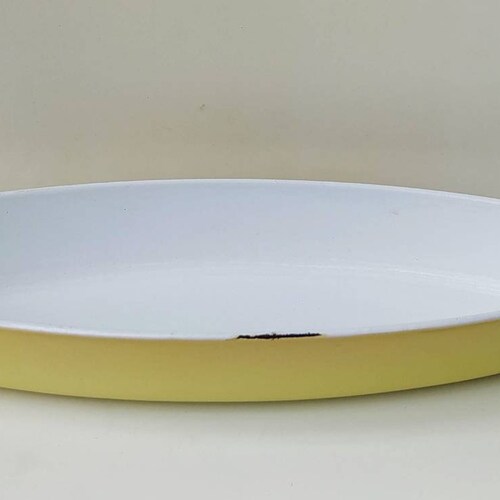 Flat long oval flat fish dish in yellow enamelled cast iron Le Creuset Raymond Loewy / shops casseroles oven oven in cast iron france / Holy10 Paris