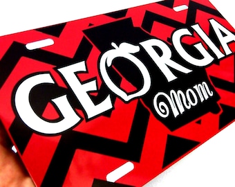 Georgia Mom License Plates and Car Tags for the Bulldog Fans. These Custom made aluminum car tags feature chevron stripes and peach logo