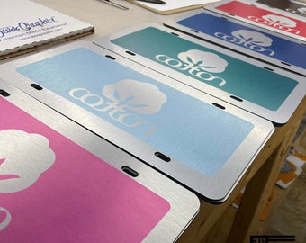 Cotton License Plate - Seal of Cotton Car Tag - Farmers Love our Agricultural License Plates. Choice of tag colors. Brushed Aluminum ACM