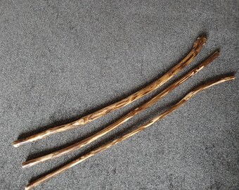 3 beautiful, unique wooden sticks approximately 23 1/4 to 24 inches. Great for macrame wall art projects.