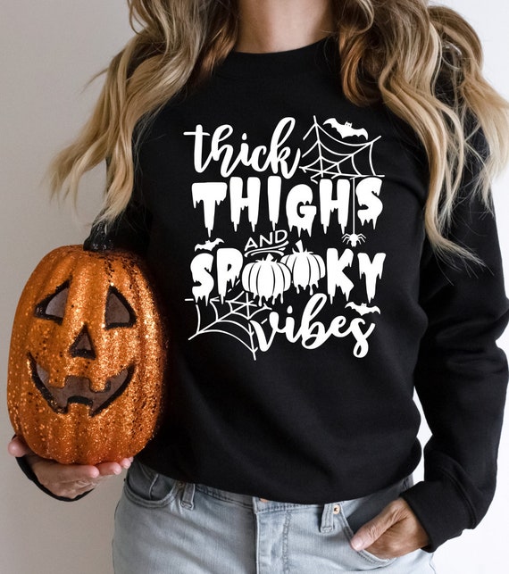 Thick Thighs and Spooky Vibes Halloween Sweatshirt