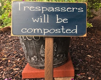 Trespassers will be composted garden stake sign