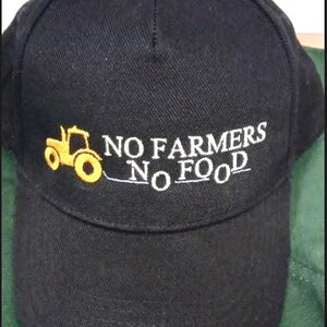 May include: Black baseball cap with a white embroidered tractor and the text "NO FARMERS NO FOOD".