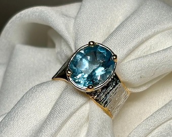 Blue Topaz Ring: 22K Gold Accent, Rhodium Plated 925 Silver