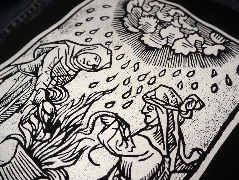 May include: Black and white illustration depicting a scene with figures, rain, and flames. A robed figure descends from above, while another figure below appears to be holding a snake. The artwork has a vintage, woodcut style.