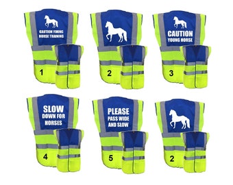May include: A collection of high-visibility safety vests. Each vest features a blue upper section with white text and a horse silhouette. The vests have reflective stripes and are primarily neon yellow. Text includes "Caution Young Horse Training" and "Slow Down for Horses."