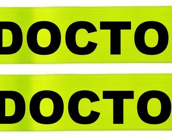 A Pair of of Yellow Armbands Printed DOCTOR 17" x 1 3/4" Hook and Loop Closure