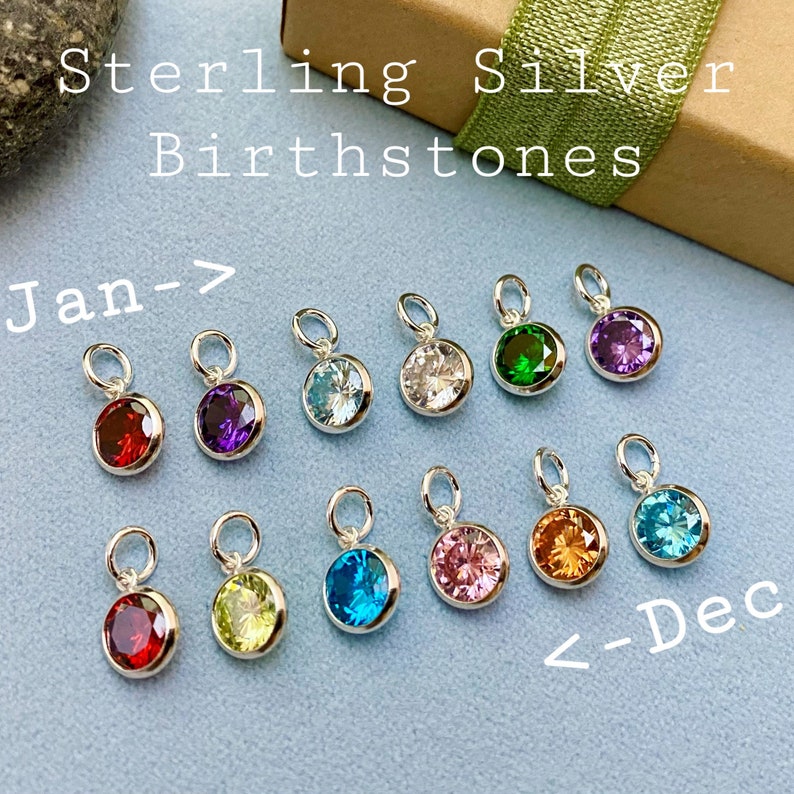 Birthstones shown in color order from Red January to Blue December