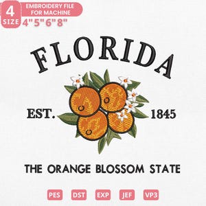 K&ouml;nnte beinhalten: Ein Stickdateidesign mit dem Wort "FLORIDA" in Schwarz, Orangen und wei&szlig;en Bl&uuml;ten. Der Text "EST. 1845" und "THE ORANGE BLOSSOM STATE" sind enthalten. Erh&auml;ltlich in den Gr&ouml;&szlig;en 10,16 cm, 12,7 cm, 15,24 cm und 20,32 cm.