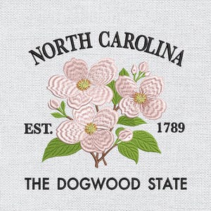 May include: Embroidered design featuring the words "North Carolina" above a floral arrangement of pink dogwood blossoms, green leaves, and the text "The Dogwood State." The year "1789" is also included.