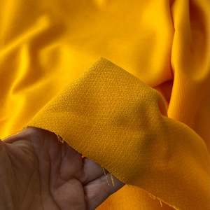 Yellow wool double crepe fabric