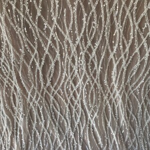 Off white Ivory Bridal Lace fabric embroidered with beads and pearls, heavy ornate border wedding dress lace