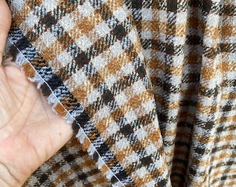 Check pattern wool suiting, boucle wool earth tones, Women’s check wool suiting Dormeuil made in France