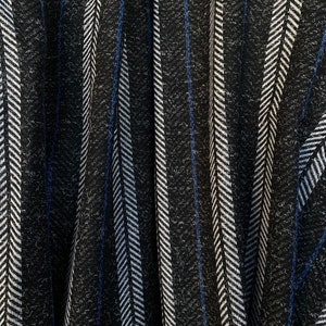 large herring bone chevron design, cobalt blue on charcoal grey winter fabric wool mix suiting coating cape skirt poncho fabric