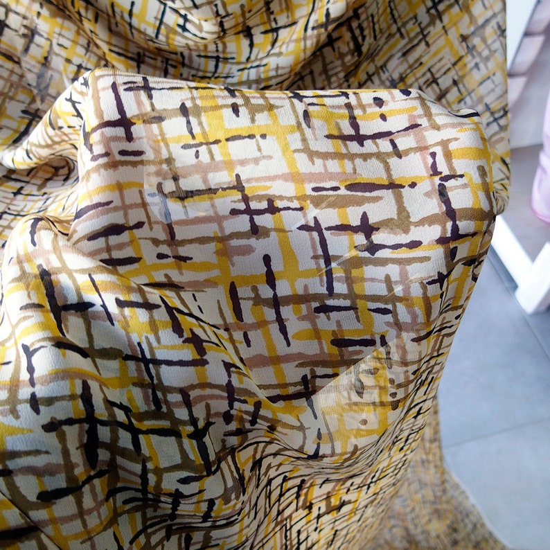 silk chiffon fabric abstract print brown beige yellow gold semi opaque multi color kaftan kimono evening 140cm wide Italy
