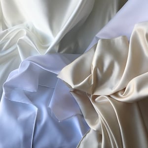 white duchess satin, ivory duchess satin, cream satin polyester duchess satin bridal duchess satin fabric  140 grams sqm 150cm wide 60 “