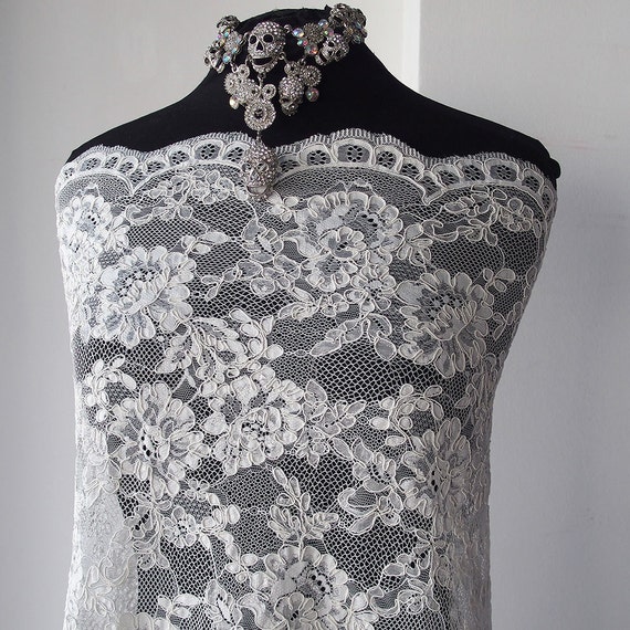 white ivory Alencon corded lace fabric bridal wedding dress scallop edge floral Marco Lagattolla