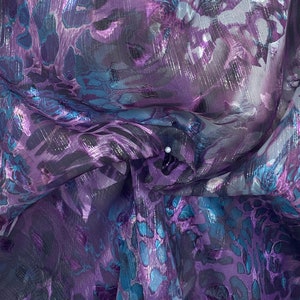 Silk chiffon with Lurex animal print teal on purple 140cm width