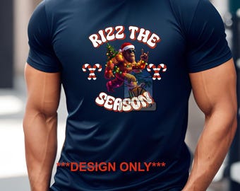 May include: Navy blue t-shirt with a festive graphic. The design features a Bigfoot character wearing a Santa hat and holding up a peace sign, with the text "Rizz the Season". Candy cane accents and the words "DESIGN ONLY" are also present.
