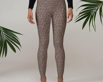 May include: A pair of leggings with a geometric pattern in shades of brown, pink, and yellow.