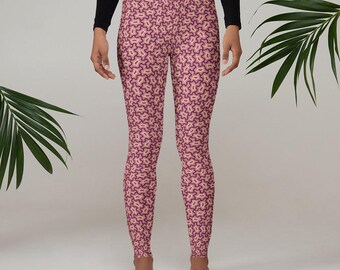 May include: Pink leggings with a geometric pattern in shades of pink and beige.
