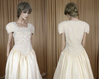 Vestido de novia vintage color marfil de los años 80: vestido de