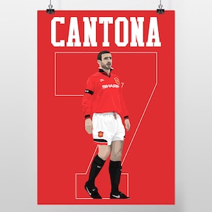 May include: A red poster featuring a stylized illustration of a soccer player in a red jersey with the name "CANTONA" above. The player is wearing a jersey with the number 7, white shorts, and black socks and shoes.