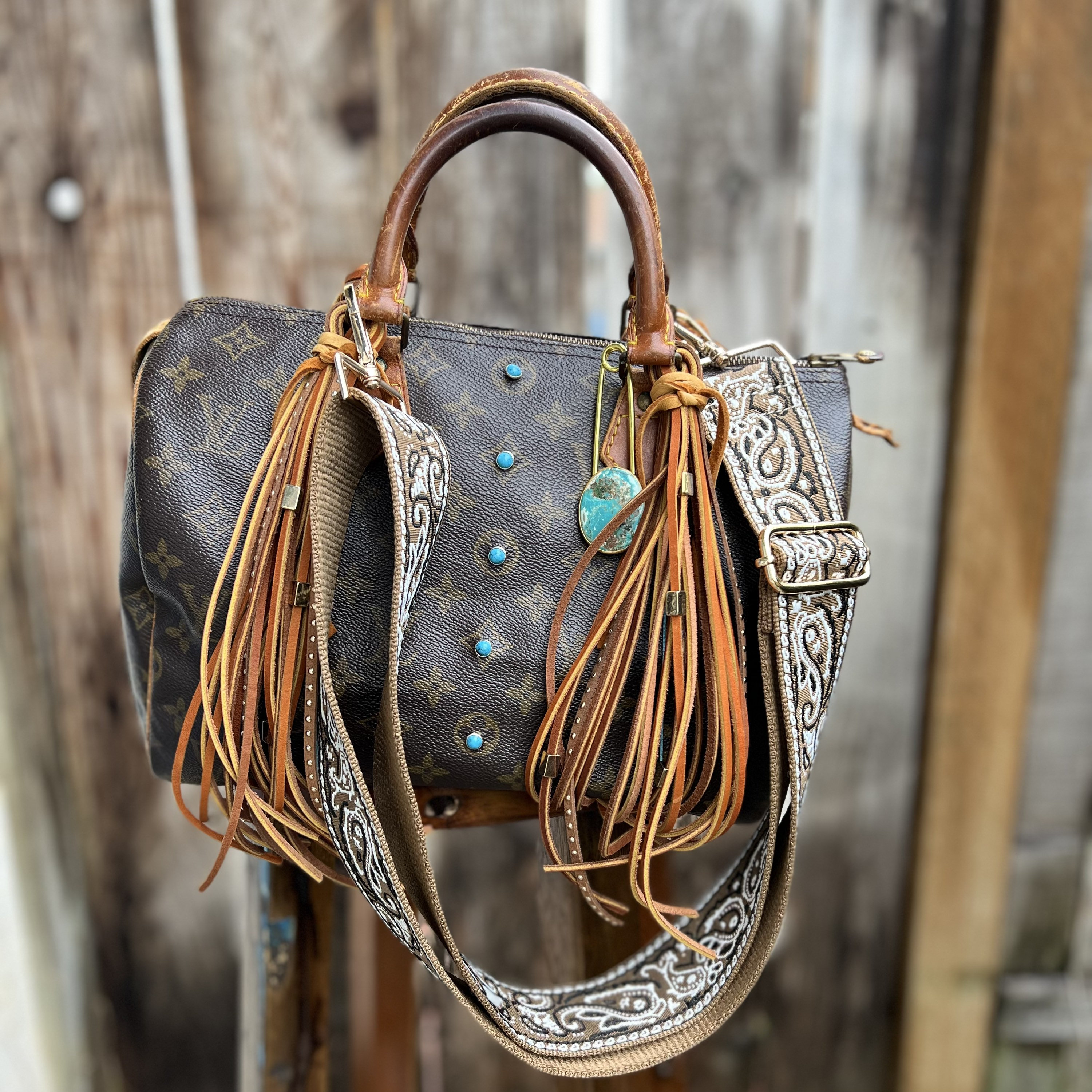 Vintage authentic reworked Louis Vuitton 1980’s Speedy 30 with turquoise  and leather fringe