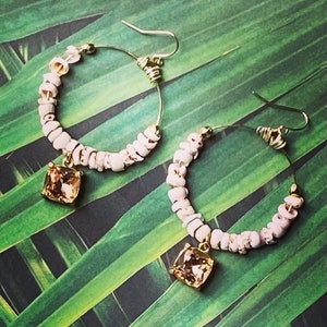 Tiger puka shell gold hoop earrings with smoky crystal detail