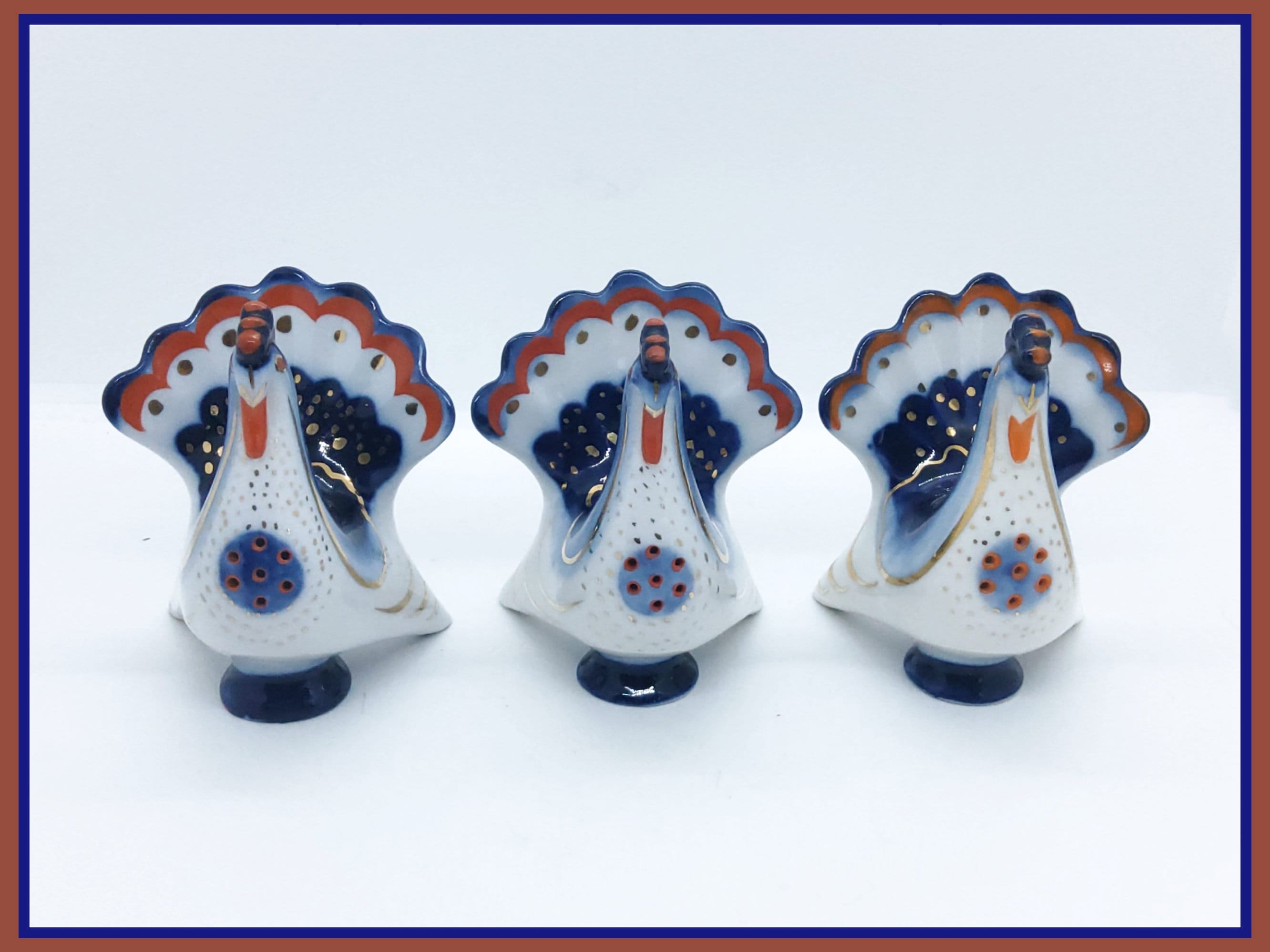 Vintage handpainted Lomonosov porcelain bird shaker