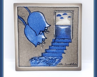 May include: A blue and white ceramic tile with a whimsical illustration of two blue flowers, a doorway with a blue sky and water, and a set of blue stairs leading up to the doorway. The tile is signed "Helga dikke-Sundetom".