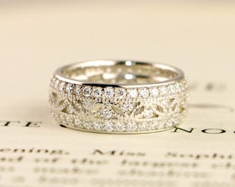 wide wedding bands for her with diamonds