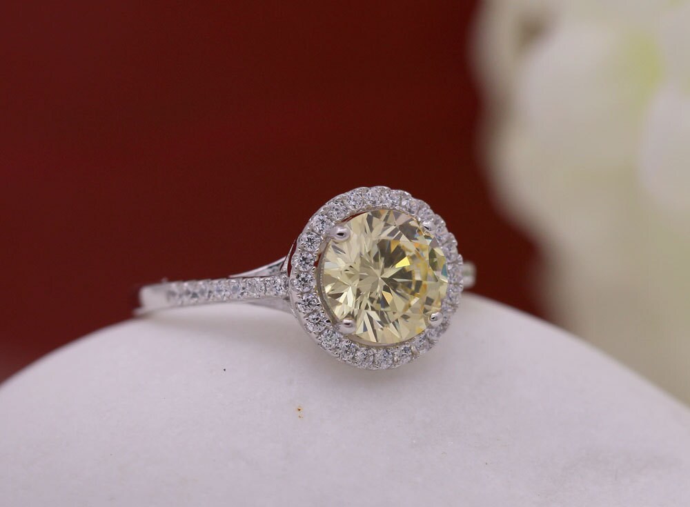 Pale yellow sale diamond engagement ring