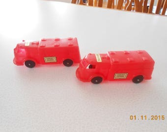 Vintage Toy Truck Set: Red Plastic Currency Exchange Trucks