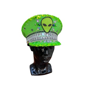 Beam Me Up Captain's Hat (Made to Order Item): featuring a lime holographic green base & chains, silver accents, and an alien centerpiece