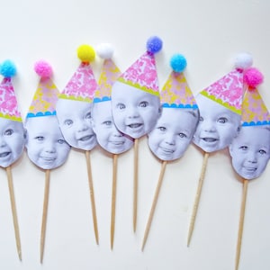 Personalised Face, Happy Heads, Cocktail Stick,  12 Cupcake Toppers with Pom Pom Party Hats, Floral Pattern