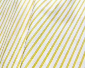 1 yds white cotton  with yellow stripes