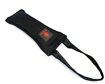 May include: Black dog chew toy with a red logo that says "Firepaw". The toy has a handle for easy gripping.