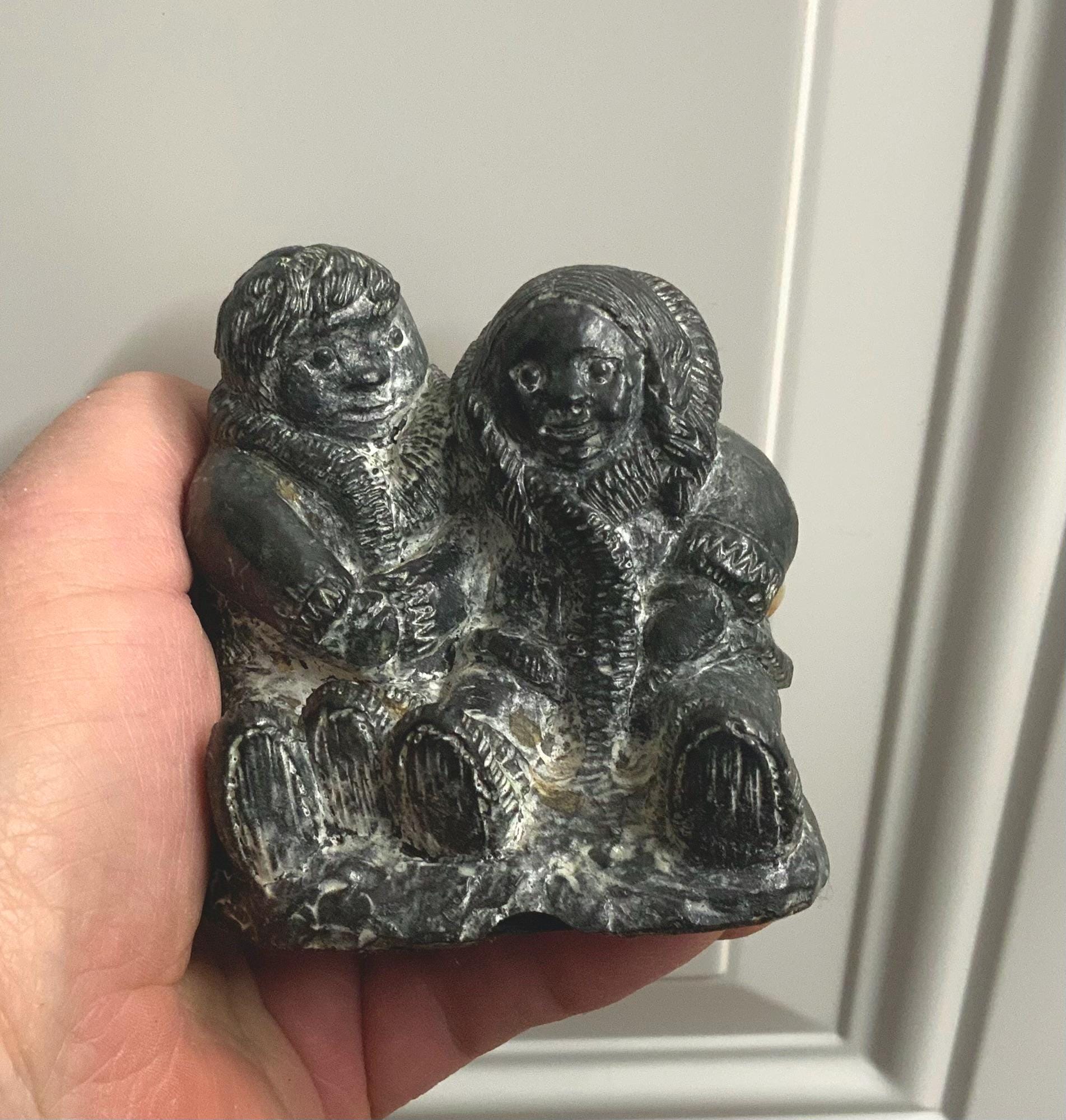 A Wolf Original Sculpture, Soap Stone Carving, Boy & Girl Holding