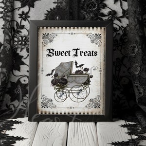 May include: A vintage-style sign with black and white stripes, featuring a black and white illustration of a baby carriage with black roses and bats. The sign reads "Sweet Treats".