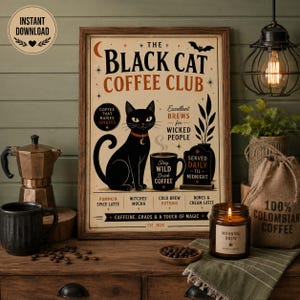 May include: A framed poster titled The Black Cat Coffee Club featuring a black cat illustration, a coffee mug, and text including Excellent Brews for Wicked People, Pumpkin Spice Latte, Witches Mocha, Cold Brew Potions, and Bones & Cream Latte.
