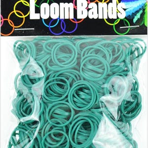 May include: A package of teal-colored Loom Bands, a popular crafting item. The package includes 500 bands and 25 clasps. The packaging features the words "Loom Bands" in large white letters, with colorful circles in the background.