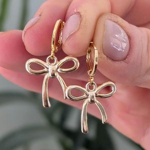 Gold bow earrings, earring stack, huggie earrings, hook earrings, gold plated stainless steel earrings