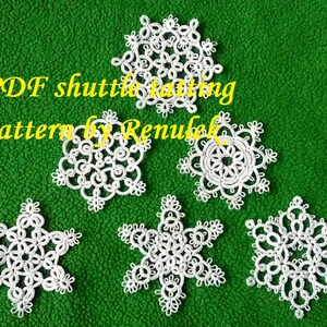 May include: Six white snowflake patterns made with shuttle lace, on a green background. The text "PDF shuttle tatting pattern by Renulek" is visible in the image.